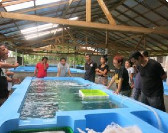 People near water tank